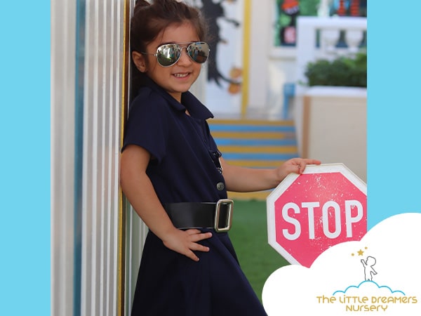 cute girl police in dreamers nursery in dubai