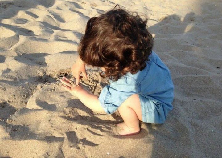 Playing with sand for motor skills